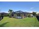 Enjoy privacy and outdoor activities in the beautifully landscaped backyard at 7311 64Th St E, Palmetto, FL 34221