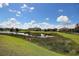 This serene backyard features a scenic water view and lush green space at 7311 64Th St E, Palmetto, FL 34221