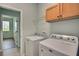 Laundry room with side-by-side washer and dryer hookups at 7311 64Th St E, Palmetto, FL 34221
