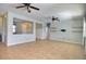 Spacious living room with tile flooring, offering a versatile and inviting space for relaxation and entertainment at 7311 64Th St E, Palmetto, FL 34221