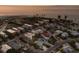 Coastal neighborhood featuring a mix of homes near the beach and tranquil ocean views from above at 799 Jacaranda Rd, Anna Maria, FL 34216