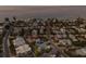 Picturesque coastal neighborhood showcasing homes near the beach, set against a calm ocean backdrop at 799 Jacaranda Rd, Anna Maria, FL 34216