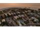 Coastal neighborhood aerial view showcasing rooftops, beach access, and a tranquil ocean backdrop at 799 Jacaranda Rd, Anna Maria, FL 34216