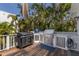 Outdoor grill area with stainless steel appliances and countertop space for cooking at 799 Jacaranda Rd, Anna Maria, FL 34216