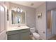 The bathroom features a single sink vanity and a shower/tub combo at 8105 Grand Estuary Trl # 105, Bradenton, FL 34212