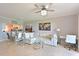 Bright and inviting living space with an adjacent kitchen and dining area, perfect for entertaining at 8105 Grand Estuary Trl # 105, Bradenton, FL 34212