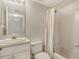 Bathroom featuring a vanity, sink, mirror, toilet and shower/tub combination at 8315 Glenrose Way # 1421, Sarasota, FL 34238