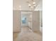 Open concept kitchen with tile flooring and natural light pouring in from the windows at 8315 Glenrose Way # 1421, Sarasota, FL 34238