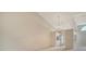 Spacious living room featuring vaulted ceilings and stylish lighting fixtures at 8315 Glenrose Way # 1421, Sarasota, FL 34238