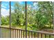 Screened-in patio featuring green landscape views and privacy at 8315 Glenrose Way # 1421, Sarasota, FL 34238