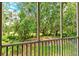 Enjoy the outdoors with beautiful greenery right outside this screened lanai at 8315 Glenrose Way # 1421, Sarasota, FL 34238