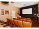 Cozy community theater room with comfortable seating, perfect for enjoying movies and entertainment at 8315 Glenrose Way # 1421, Sarasota, FL 34238