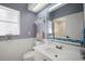 Charming bathroom featuring decorative mirror, vanity, and a sun-lit window at 8321 9Th Avenue Nw Ter, Bradenton, FL 34209