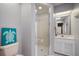 This bathroom features a glass door shower and modern decor at 8321 9Th Avenue Nw Ter, Bradenton, FL 34209