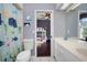 This bathroom features marine-themed decor and doorway into the bedroom with a bunk bed at 8321 9Th Avenue Nw Ter, Bradenton, FL 34209