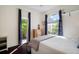 Cozy bedroom with hardwood floors and large windows for plenty of natural light at 8321 9Th Avenue Nw Ter, Bradenton, FL 34209
