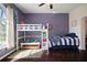 Cozy ' bedroom featuring bunk beds, hardwood floors, and a bright, playful atmosphere at 8321 9Th Avenue Nw Ter, Bradenton, FL 34209