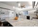 Kitchen with white cabinets, granite countertops, stainless steel appliances and hardwood floors at 8321 9Th Avenue Nw Ter, Bradenton, FL 34209
