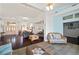 Open living space with high ceilings, dark hardwood floors, and views of the entryway, kitchen, and sunroom at 8321 9Th Avenue Nw Ter, Bradenton, FL 34209
