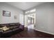 Comfortable living area with dark wood floors, neutral walls and an inviting leather sofa at 8321 9Th Avenue Nw Ter, Bradenton, FL 34209