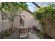 Cozy patio featuring a stone surface, seating, and lush greenery creating a private outdoor space at 8321 9Th Avenue Nw Ter, Bradenton, FL 34209