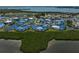 Waterfront condo complex surrounded by lush greenery and waterways at 939 Sandpiper Cir, Bradenton, FL 34209