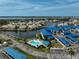 Waterfront community featuring a swimming pool, parking, and beautiful water views at 939 Sandpiper Cir, Bradenton, FL 34209