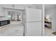 Well-lit kitchen featuring modern appliances and ample counter space at 939 Sandpiper Cir, Bradenton, FL 34209