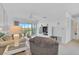 Cozy living room with plush seating and sliding glass doors to a balcony at 939 Sandpiper Cir, Bradenton, FL 34209