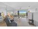 Spacious living room with comfortable seating, and a beautiful water view at 939 Sandpiper Cir, Bradenton, FL 34209