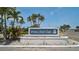 Perico Bay Club entrance sign surrounded by lush landscaping at 939 Sandpiper Cir, Bradenton, FL 34209