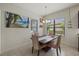Cozy breakfast nook bathed in natural light, perfect for relaxed dining with Gathering and friends at 9769 Highland Park Pl, Palmetto, FL 34221
