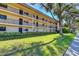 Well-maintained multi-story building featuring private balconies, lush landscaping and curb appeal at 104 Capri Isles Blvd # 207, Venice, FL 34292