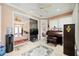 Versatile bonus room with tile flooring and access to other rooms at 10523 Old Grove Cir, Bradenton, FL 34212