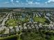 Community aerial view showcases lush landscaping, water features, and neighborhood amenities at 12149 Forest Park Cir, Bradenton, FL 34211