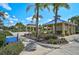 Charming community pavilion with picnic tables, perfect for gatherings in a park setting at 12149 Forest Park Cir, Bradenton, FL 34211