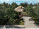 Charming home exterior featuring a well-manicured lawn and lush landscaping at 12149 Forest Park Cir, Bradenton, FL 34211