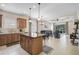 Spacious open concept kitchen with granite countertops flowing into dining and living areas at 12149 Forest Park Cir, Bradenton, FL 34211