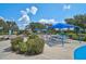Community playground featuring slides, swings, and picnic tables for outdoor Gathering fun at 12149 Forest Park Cir, Bradenton, FL 34211
