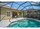 Inviting screened-in pool with steps, offering a relaxing outdoor retreat and a tranquil escape at 12149 Forest Park Cir, Bradenton, FL 34211