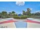 Central community statue surrounded by a garden area with benches and walking paths at 12149 Forest Park Cir, Bradenton, FL 34211