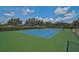 Community tennis court, perfect for residents to play and stay active at 12149 Forest Park Cir, Bradenton, FL 34211