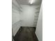 Walk-in closet features multiple wire shelves for ample storage and organization at 1304 56Th W St, Bradenton, FL 34209
