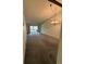 Bright living room featuring sliding glass doors and neutral carpet and lighting at 1304 56Th W St, Bradenton, FL 34209