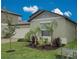 This home features a well manicured front yard with mature landscaping and great curb appeal at 13156 Merlot Sunstone Cv, Parrish, FL 34219