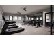 Community gym with treadmills, weights, and exercise bikes, perfect for staying active and healthy at 13156 Merlot Sunstone Cv, Parrish, FL 34219