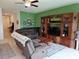 Inviting living room features a cozy seating arrangement, entertainment center, and bright natural light at 13156 Merlot Sunstone Cv, Parrish, FL 34219