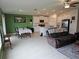 Open concept living area connecting kitchen, dining, and living room at 13156 Merlot Sunstone Cv, Parrish, FL 34219