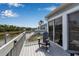 Home's private deck offers serene water views, with space for outdoor seating and relaxing by the waterfront at 1322 Perico Point Cir, Bradenton, FL 34209