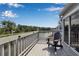 Outdoor deck featuring a view of a calm canal and seating at 1322 Perico Point Cir, Bradenton, FL 34209